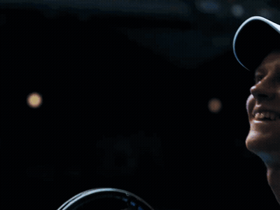 Smiling Man In White Hat Looking Up GIF