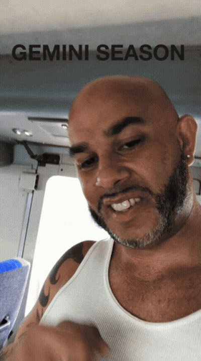 Smiling Man In White Tank Top Gemini Season GIF