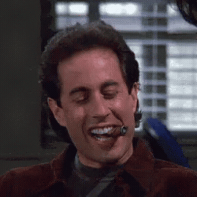 Smiling Man Smoking Cigar GIF