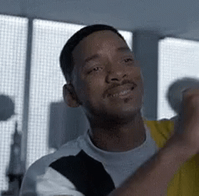 Smiling Man Standing By Window GIF