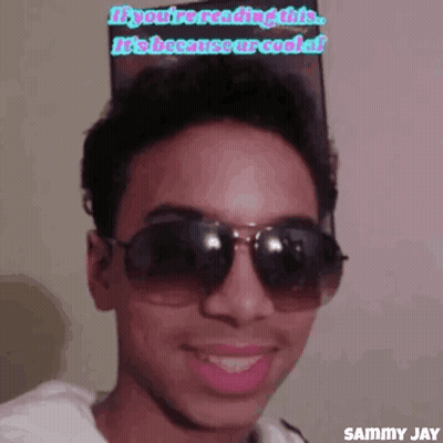 Smiling Man Wearing Sunglasses Says You're Cool GIF