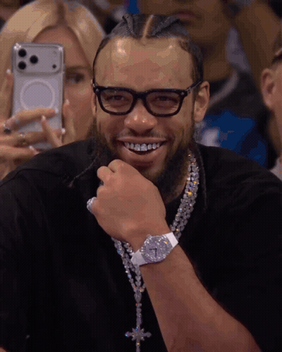 Smiling Man With Glasses And Diamond Necklace GIF
