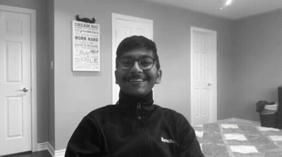 Smiling Man With Glasses, Bench Jacket Dream Big GIF