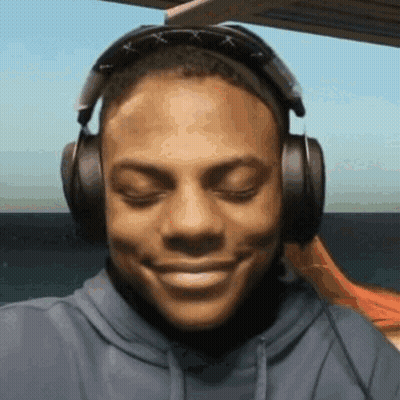 Smiling Man With Headphones And Sunglasses GIF