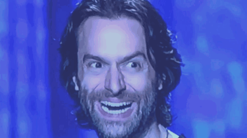 Smiling Man With Long Hair And Beard GIF