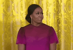 Smiling Michelle Obama GIF