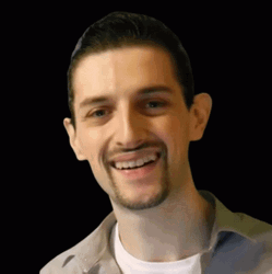 Smiling Nerdy Guy Green Uno Reverse Card GIF