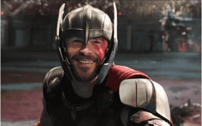 Smiling Superhero With Bloody Helmet GIF