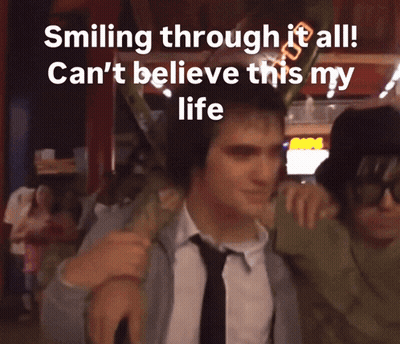 Smiling Through It All Can 'T Believe This My Life Written On A Picture GIF