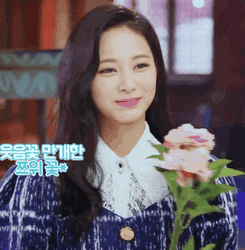 Smiling Tzuyu Holding Flowers GIF
