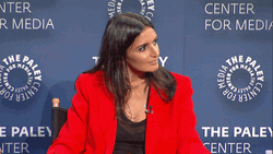 Smiling Woman Fingers Crossed GIF