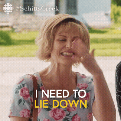 Smiling Woman Floral Shirt I Need Lie Down GIF