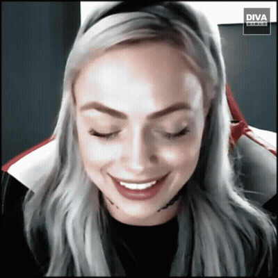 Smiling Woman In Front Of Diva Website GIF