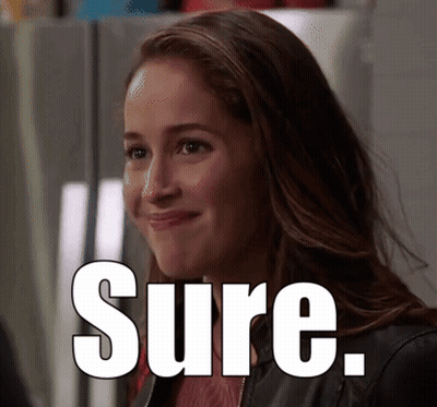 Smiling Woman In Front Of Sure Sign GIF