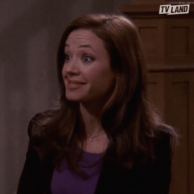 Smiling Woman In Purple Shirt TV Land Logo GIF