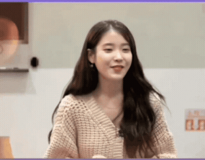 Smiling Woman In Sweater GIF