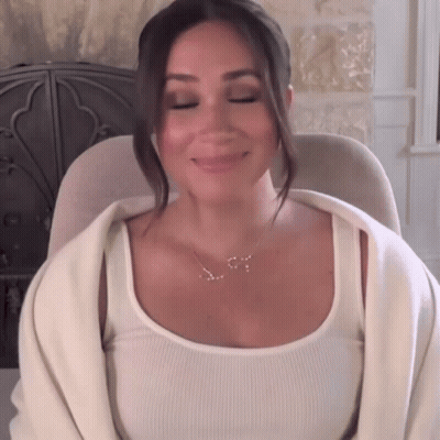 Smiling Woman In White Shirt And Sunglasses Clapping GIF