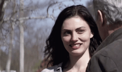 Smiling Woman Looking At Man GIF