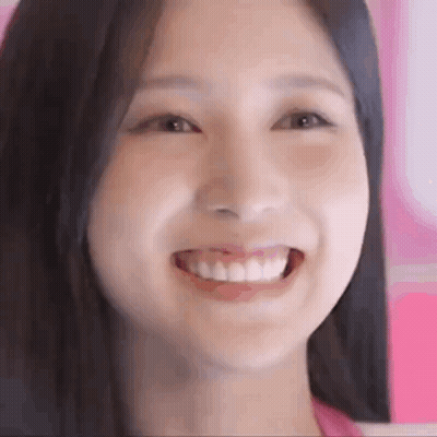 Smiling Woman Pink Background GIF