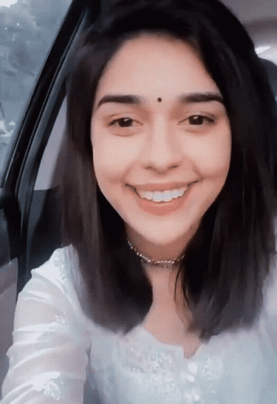 Smiling Woman Sitting In Car GIF
