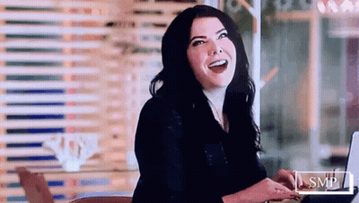 Smiling Woman Using Laptop GIF
