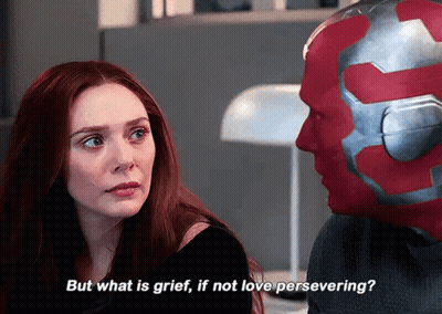Smiling Woman With Afro Says I Got You A Present GIF