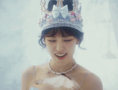 Smiling Woman With Crown And Necklace GIF