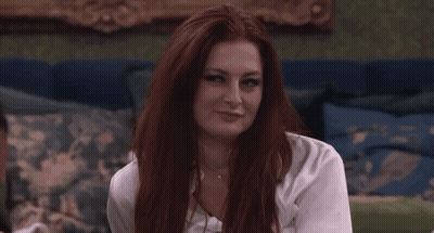 Smiling Woman With Red Hair And White Shirt GIF