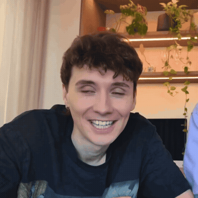 Smiling Young Man With Eyes Closed Black Shirt GIF