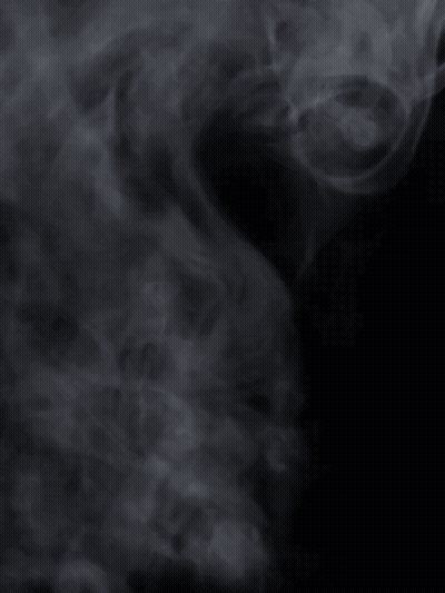 Smoke Coming Out Of A Fork On Black Background GIF