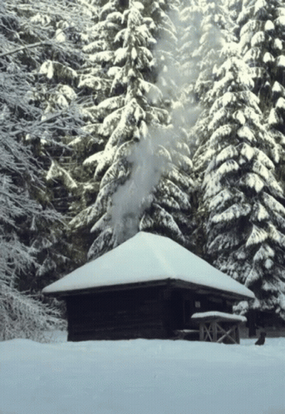 Smoke From Chimney Of Snow Covered Cabin GIF