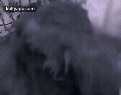 Smoke From Person's Face GIF