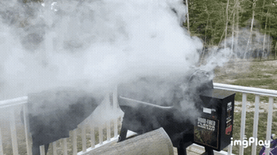 Smoke Is Coming Out Of A Box That Says Wood Roast GIF