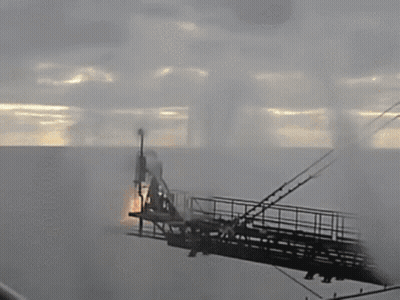 Smoke Is Coming Out Of A Machine With A Flame Coming Out Of The Top GIF