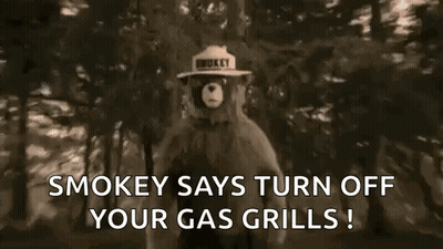 Smokey The Bear Is Wearing A Hat That Says Smokey Says Turn Off Your Gas Grills . GIF