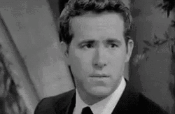 Smug Ryan Reynolds GIF