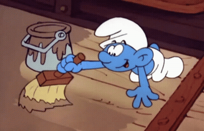 Smurf Laying On Floor With Broom And Paint Bucket GIF