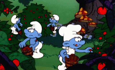 Smurfs Picking Apples In Garden GIF