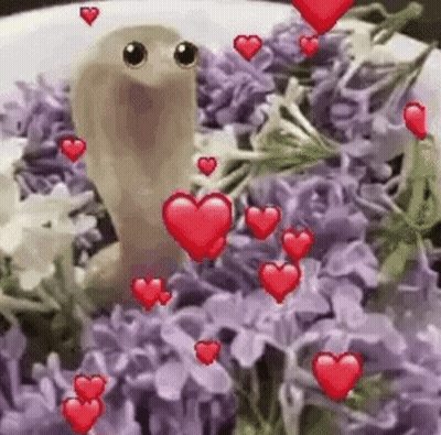 Snake Surrounded By Purple Flowers And Hearts GIF