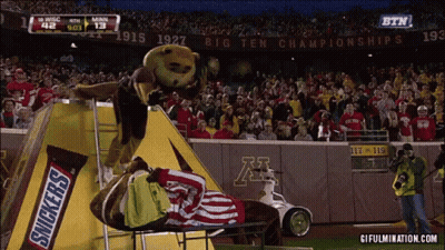 Snickers Bar as Mascot on Football Field
