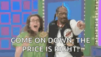 Snoop Dogg And A Woman Are Standing Next To Each Other On A Game Show And The Woman Is Screaming . GIF