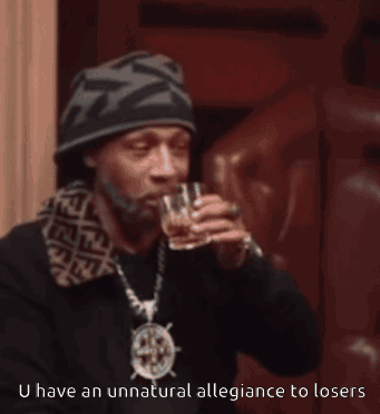 Snoop Dogg Drinking From A Glass With The Words U Have An Unnatural Allegiance To Losers GIF
