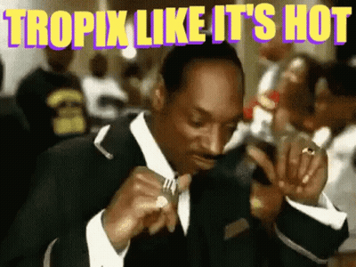 Snoop Dogg Eating With Fork Looking At Cell Phone GIF