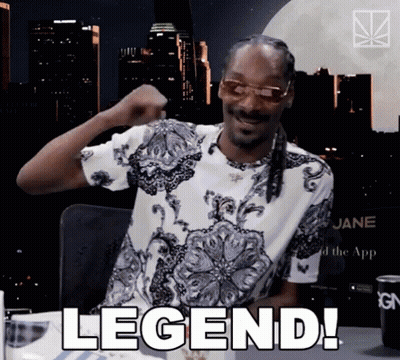 Snoop Dogg Fist In The Air Saying Legend GIF