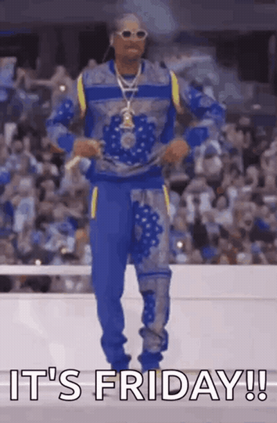 Snoop Dogg Is Dancing In Front Of A Crowd And The Words `` It 'S Friday '' Are Written On The Screen . GIF