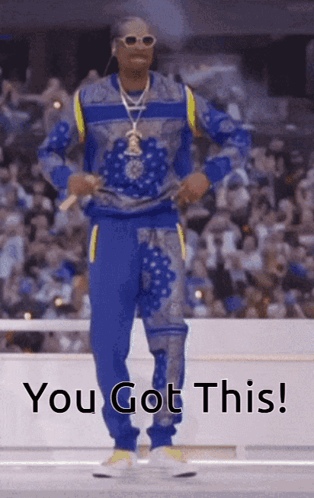 Snoop Dogg Is Dancing In Front Of A Crowd With The Words You Got This Written Below Him GIF