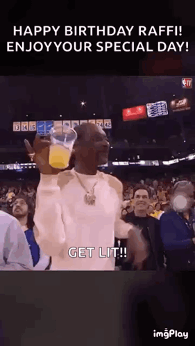 Snoop Dogg Is Holding A Glass Of Orange Juice In Front Of A Crowd Of People . GIF