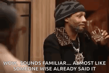 Snoop Dogg Is Holding A Glass Of Whiskey And Saying Wow , Sounds Familiar . GIF