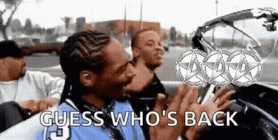 Snoop Dogg Is Sitting In The Driver 'S Seat Of A Car With A Group Of People . GIF