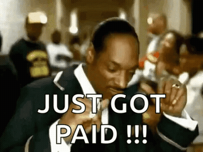Snoop Dogg Is Smoking A Cigarette And Says `` Just Got Paid '' . GIF